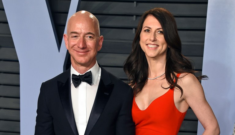 In this March 4, 2018 file photo, Jeff Bezos and wife MacKenzie Bezos arrive at the Vanity Fair Oscar Party in Beverly Hills, Calif.