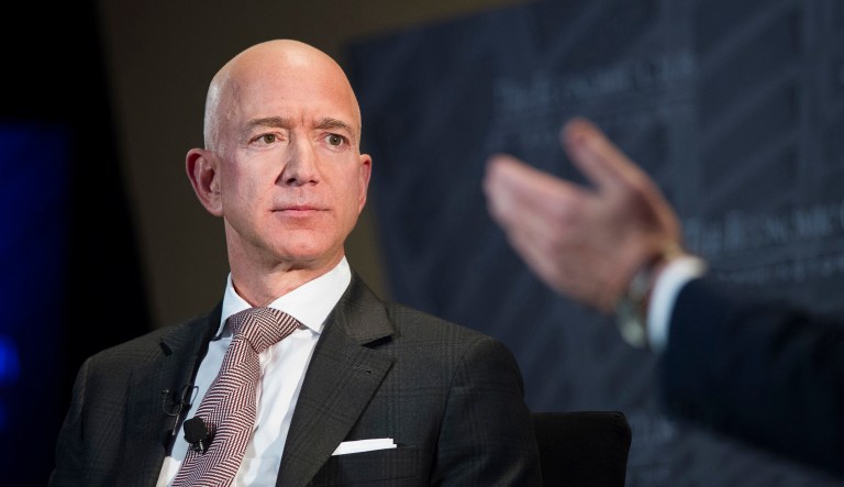 FILE - In this Sept. 13, 2018, file photo Jeff Bezos, Amazon founder and CEO, speaks at The Economic Club of Washington's Milestone Celebration in Washington.