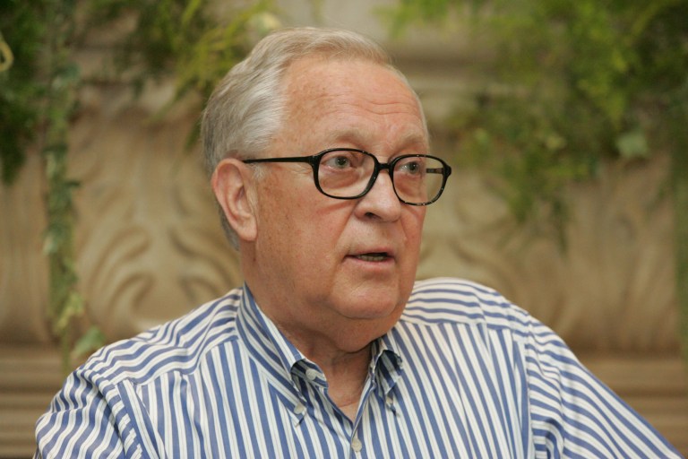 FILE - In an Aug. 24, 2005 photo  then University of Nevada Chancellor Jim Rogers announces in Las Vegas that he will continue at the helm of the university system.  Rogers, a philanthropist and education advocate, died Saturday evening June 14, 2014, at his Las Vegas home after a bout with cancer. He was 75.  (AP Photo/Las Vegas Sun, Sam Morris, file)