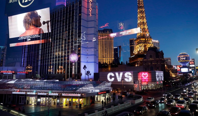 A gunman barricaded himself inside a bus Saturday along the Las Vegas Strip. (AP Photo/John Locher)