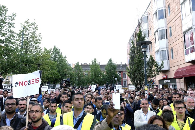 Some of the almost 5,000 protestors attending a demonstration against ISIS, in Oslo, Monday, Aug. 25, 2014. Different Muslim groups were behind the initiative which was attended by political and Muslim leaders. ISIS is an acronym for the Islamic State group. (AP Photo/NTB Scanpix, Torstein Boe) NORWAY OUT