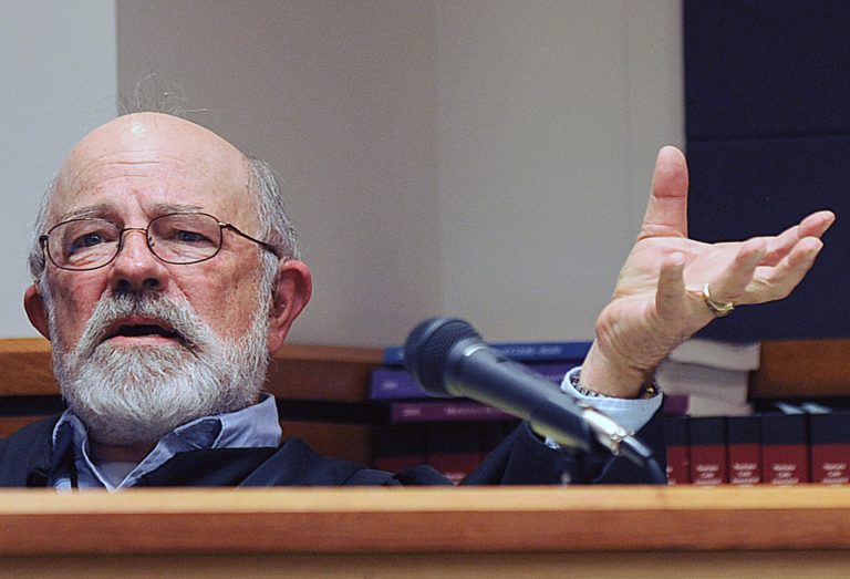 In this undated file photo, Montana District Judge G. Todd Baugh presides at a hearing in Great Falls, Mont. Baugh, the Montana judge who said a teen rape victim appeared âolder than her chronological age,â said he plans to retire at the end of the year. (AP Photo/Billings Gazette, Larry Mayer, File)