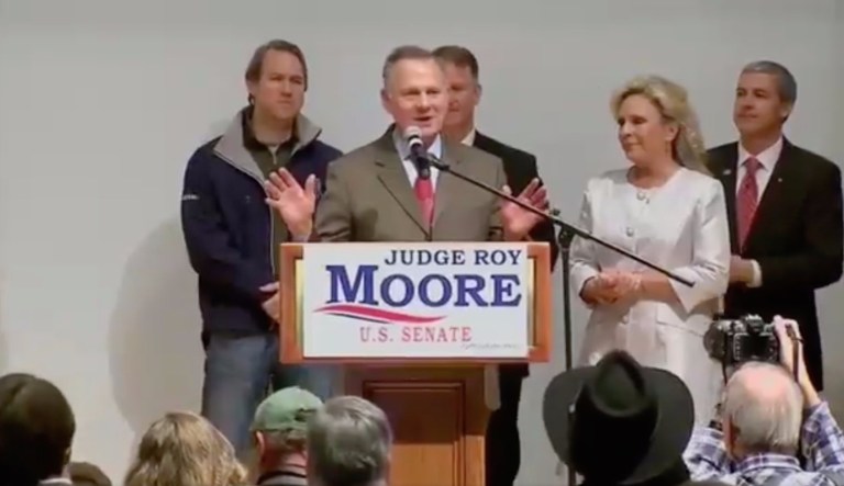 Republican U.S. Senate candidate Roy Moore watched election returns with staff Tuesday night in Montgomery, Ala., as it became clear the results were not in his favor. (screengrab)