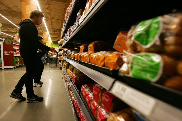 A shopper browses the bread aisle at a Fresh & Easy grocery as Tesco PLC, the UK's biggest retailer, officially enters the U.S. market, opening its first six stores in southern California on November 8, 2007 in Los Angeles, California. (Photo by David McNew/Getty Images)