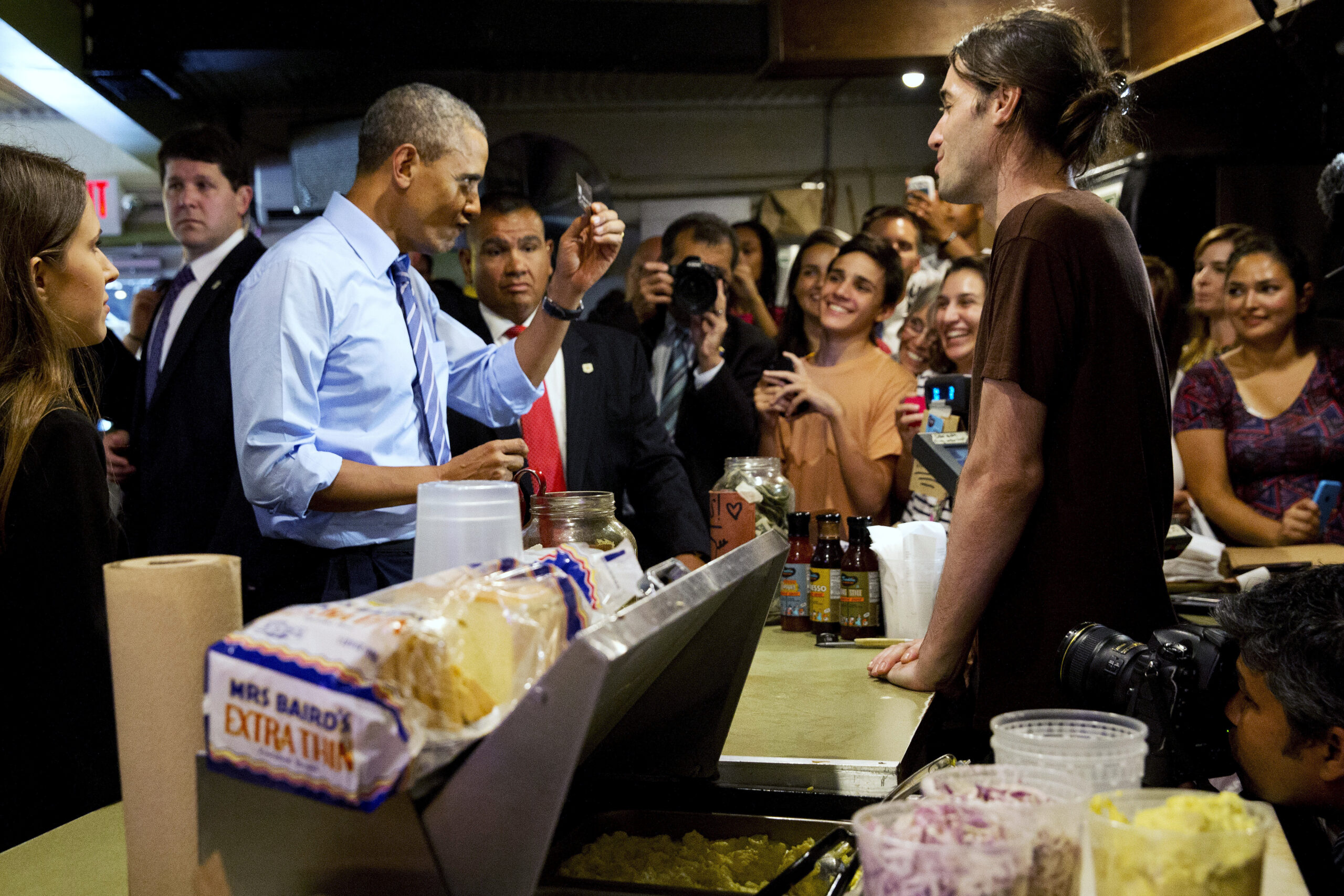 After saying he’s not interested in photo-ops, Obama concludes Texas trip with … a photo-op