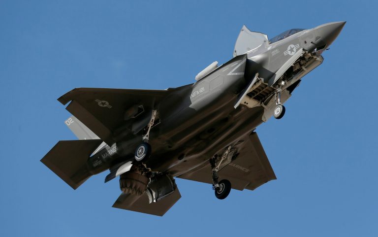 An F-35B fighter jet, the U.S. Marine Corps variant of the F-35, flies into Luke Air Force Base on Dec. 10 in Goodyear, Ariz. (AP Photo/Ross D. Franklin)