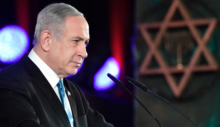 Israeli Prime Minister Benjamin Netanyahu makes his speech as he and Russian President Vladimir Putin attend an unveiling ceremony of the Remembrance Candle monument for heroes of besieged Leningrad during World War Two, in Jerusalem, Israel, Thursday, Jan. 23, 2020. Putin arrived to attend the World Holocaust Forum, which coincides with the 75th anniversary of the liberation of the Auschwitz death camp.