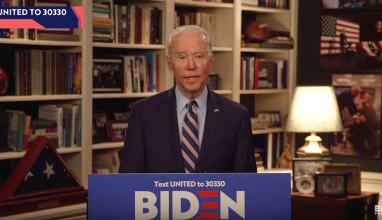 Joe Biden live-streams a message from his home in Wilmington, DE.
