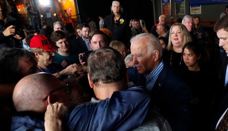 Former Vice President and Democratic presidential candidate Joe Biden greets audience members during a rally, Wednesday, May 1, 2019, in Iowa City, Iowa.