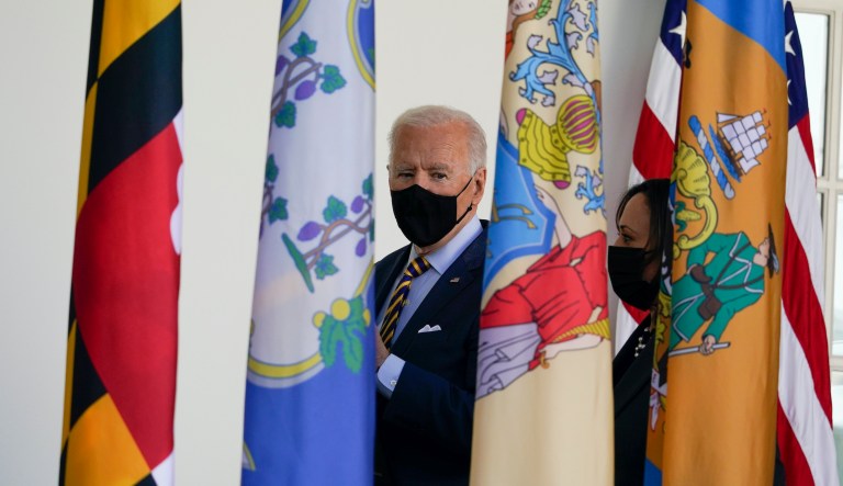 President Joe Biden and Vice President Kamala Harris walk back to the Oval Office after speaking about the American Rescue Plan, a coronavirus relief package, in the Rose Garden of the White House, Friday, March 12, 2021, in Washington. 