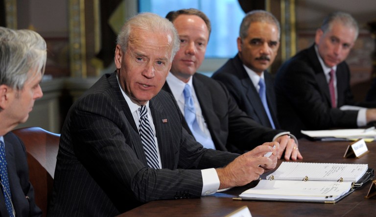 FILE- In this Jan. 11, 2013, file photo Vice President Joe Biden, second from left, with Attorney General Eric Holder, second from right, speaks during a meeting with representatives from the video game industry in Washington. 