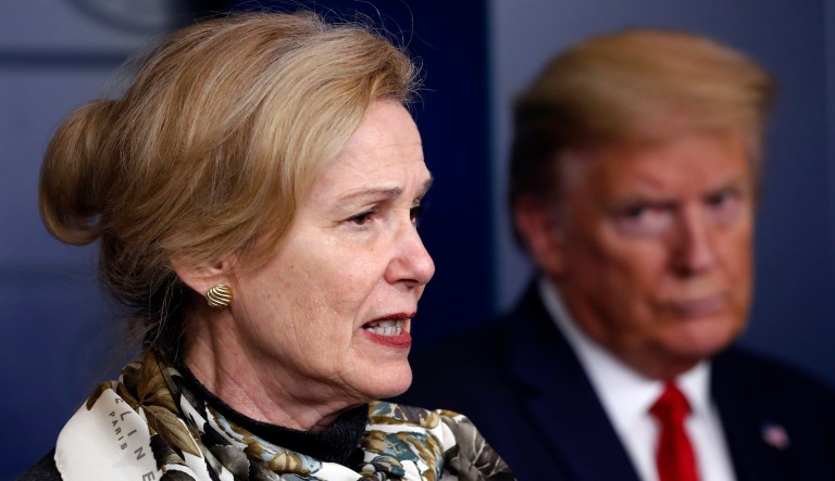 President Donald Trump listens as Dr. Deborah Birx, White House coronavirus response coordinator, speaks about the coronavirus in the James Brady Press Briefing Room of the White House, Wednesday, April 22, 2020, in Washington. 