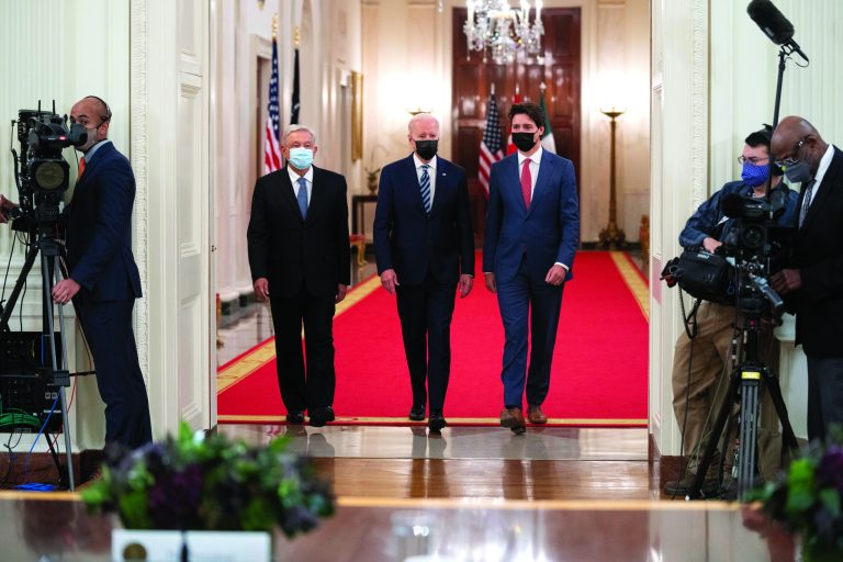 Andres Manuel Lopez Obrador, Mexico's president, from left, U.S. President Joe Biden, and Justin Trudeau, Canada's prime minister, arrive for the North American Leaders' Summit in the East Room of the White House on Nov. 18.