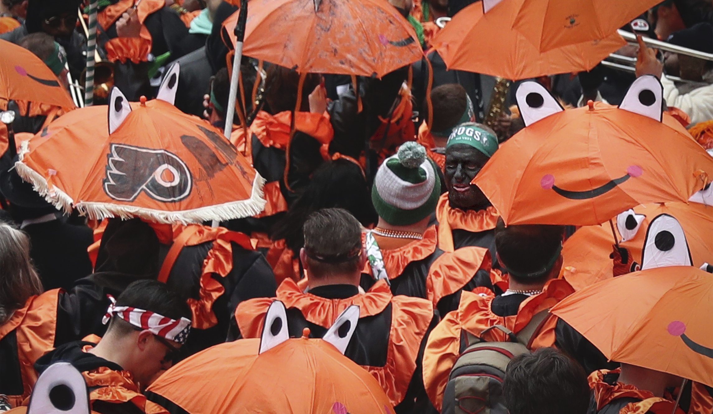 ‘Ain’t racist to me’: Blackface-wearing men defend face paint after NYE parade