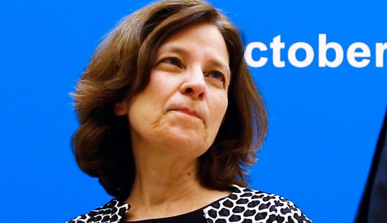 U.S. Deputy Treasury Secretary Sarah Bloom Raskin, center, chats with Angel Gurria, Secretary General of the Organisation for Economic Cooperation and Development (OECD), left, and Philippines' Secretary of Finance Cesar Purisima before the opening ceremony of the Asia-Pacific Economic Cooperation (APEC) finance ministers meeting at the Diaoyutai State Guesthouse in Beijing, China Wednesday, Oct. 22, 2014.