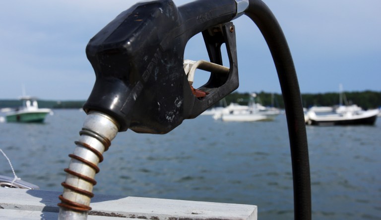 A fuel nozzle is seen at a dock at a cove full of boats in the background in Brunswick, Maine, on Tuesday June 24, 2008. 