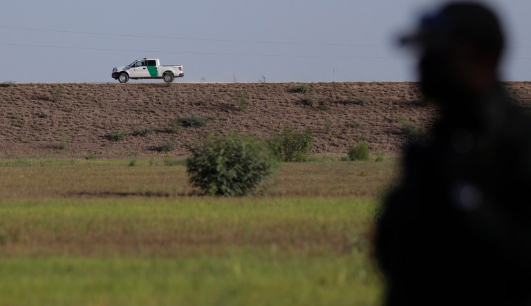In this Aug. 11, 2017, photo, U.S. Customs and Border Patrol agents patrol for immigrants suspected of crossing into the United States illegally along the Rio Grande near Granjeno, Texas. After hitting a 17-year low shortly after President Donald Trump took office, the numbers of people coming over the border have risen four months in a row.
