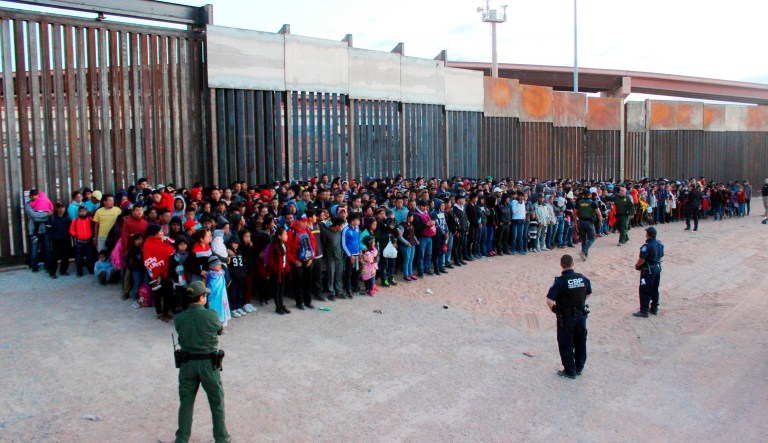 Immigrants who crossed the U.S.-Mexico border in El Paso, Texas.