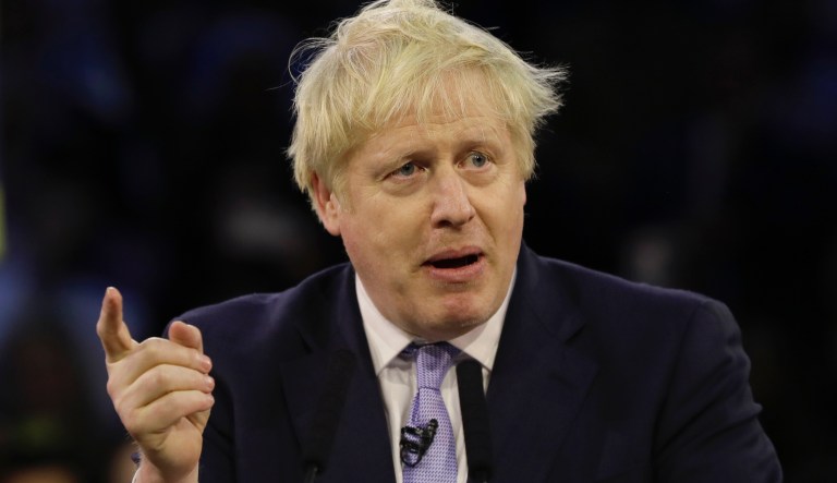 Britain's Prime Minister Boris Johnson speaks during his ruling Conservative Partyâs final election campaign rally at the Copper Box Arena in London, Wednesday, Dec. 11, 2019. Britain goes to the polls on Dec. 12. 