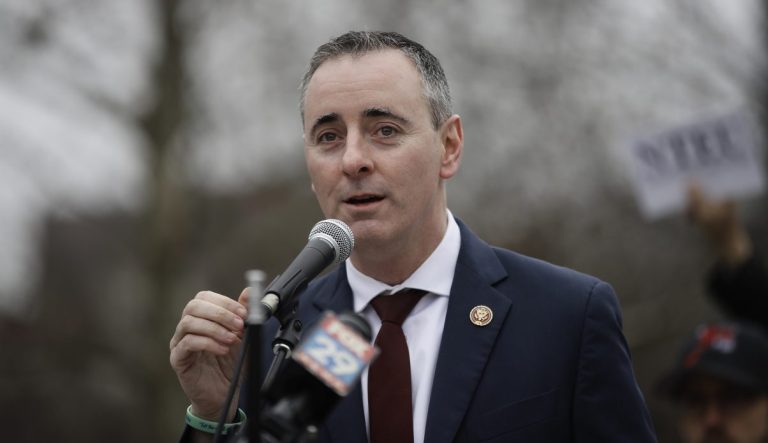 Rep. Brian Fitzpatrick, R-Pa., speaks during a demonstration against the partial government shutdown on Independence Mall in Philadelphia, Tuesday, Jan. 8, 2019.