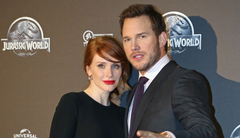U.S. actors Bryce Dallas Howard, left, and Chris Pratt pose for photographers as they arrive at the French premiere of U.S. movie "Jurassic World" in Paris, Friday May 29, 2015.