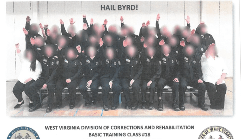 ‘Completely inappropriate’: Officials investigate photo of corrections employees giving Nazi salute