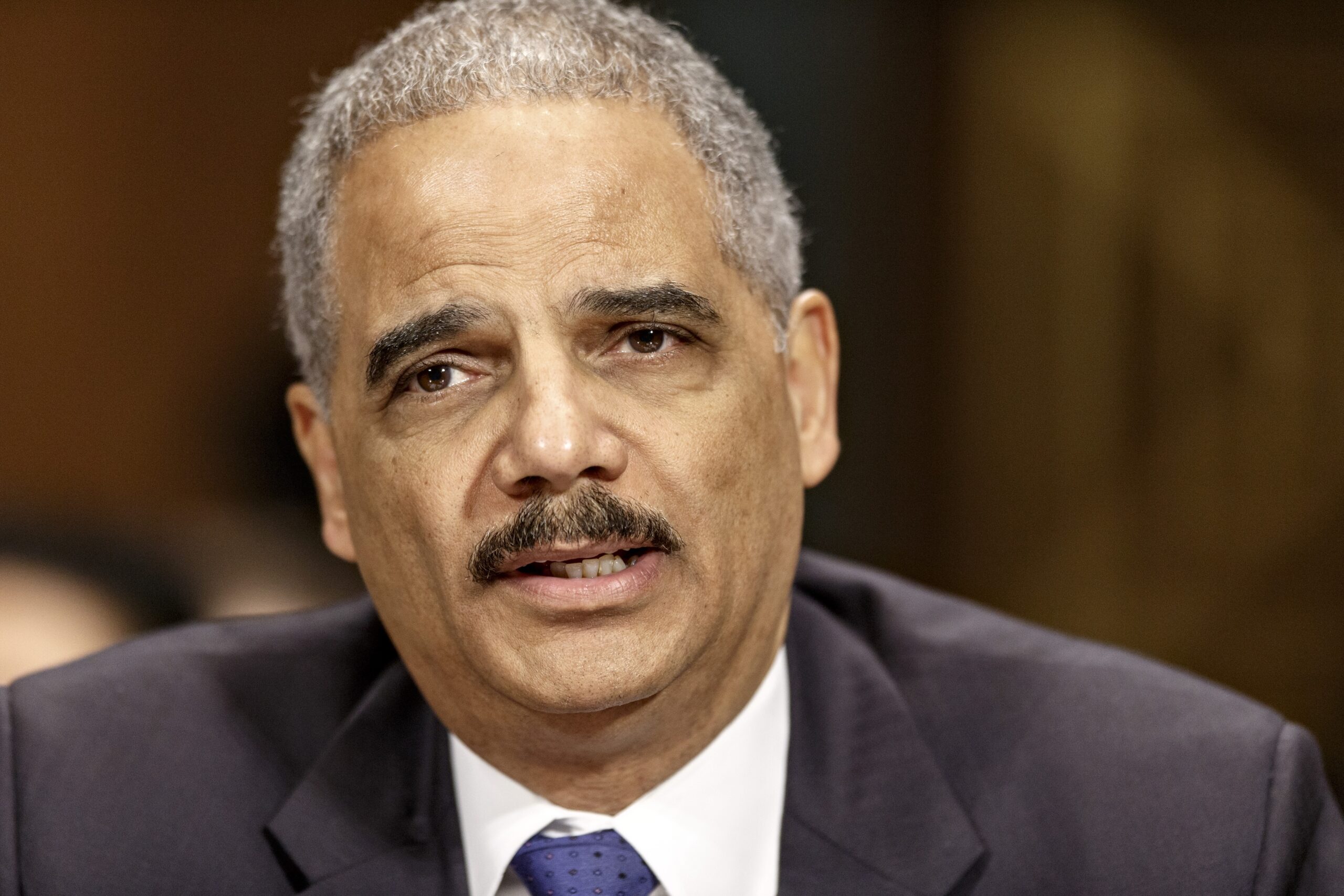 Eric Holder: Let felons start voting again
