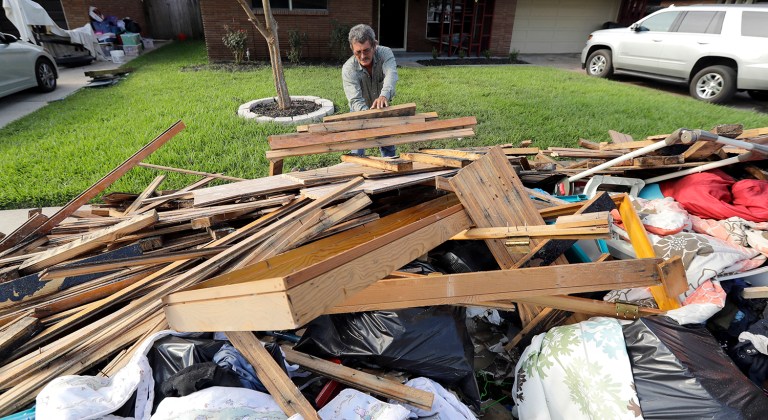 President Trump wants the hurricane aid tied to a measure increasing the debt limit. But there have been few signs so far that Congress would take that approach. (AP Photo/David J. Phillip)