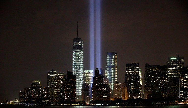The twin beams of the annual Tribute in Light commemorating the September 11, 2001 terrorist attacks shine above the city's skyline. (AP Photo/Kathy Willens)