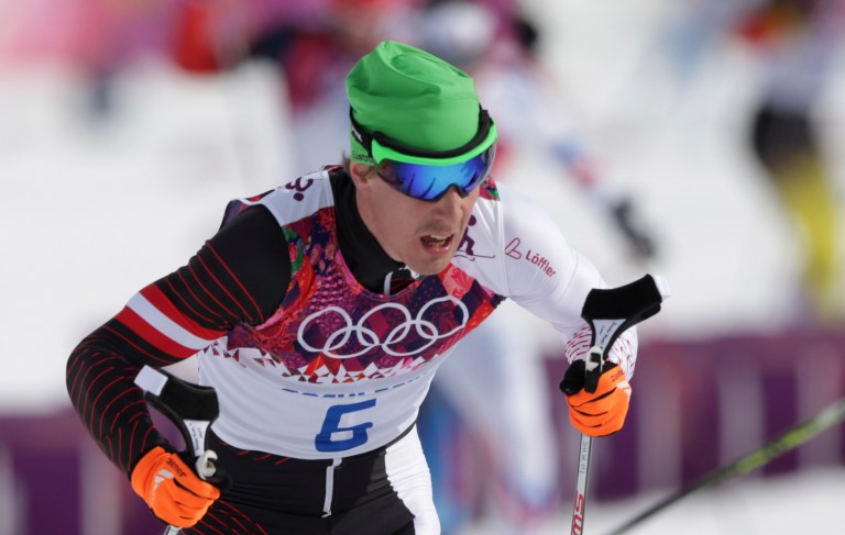 In this Feb. 9, 2014 photo Austria's Johannes Duerr competes during the men's cross-country 30k skiathlon at the 2014 Winter Olympics in Krasnaya Polyana, Russia. Duerr has been kicked out of the Sochi Games after testing positive for EPO, the country's Olympic committee said Sunday, Feb 23, 2014. It is the fifth doping case of the Olympics and the first involving the blood-boosting drug EPO. (AP Photo/Matthias Schrader)