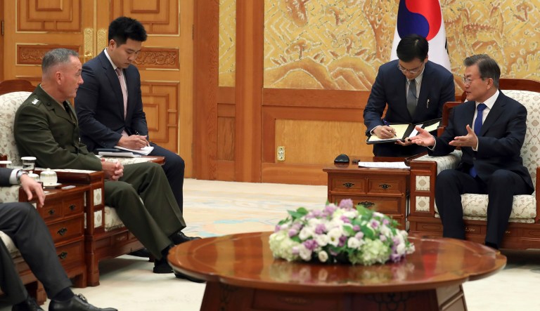 South Korean President Moon Jae-in, right, talks with U.S. Joint Chiefs Chairman Gen. Joseph Dunford, left, during a meeting at the presidential Blue House in Seoul, South Korea, Monday, Aug. 14, 2017. (Bae Jae-man/Yonhap via AP)