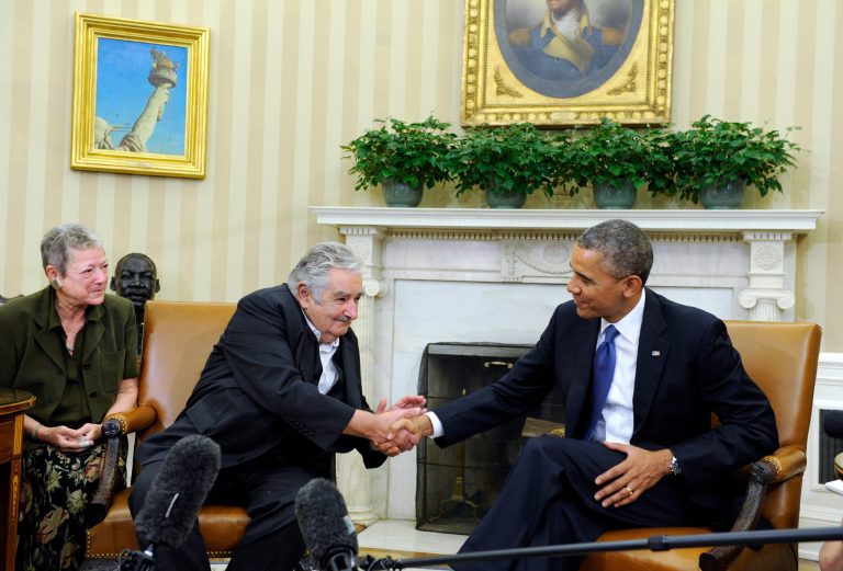 President Barack Obama shakes hands with Uruguay's President Jose Mujica during a press availability in the Oval Office of the White House in Washington, Monday, May 12, 2014. (AP Photo)