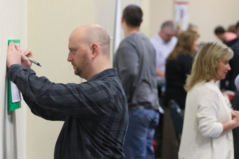 Daniel Marquardt from LaFayette, Ga., fills out an application during a job fair. (AP Photo/Chattanooga Times Free Press, Dan Henry)