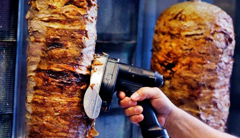 An EU Parliament committee is holding up approval of the use of phosphate in frozen döner kebab, a popular sandwich in Germany. (AP Photo/Michael Probst)