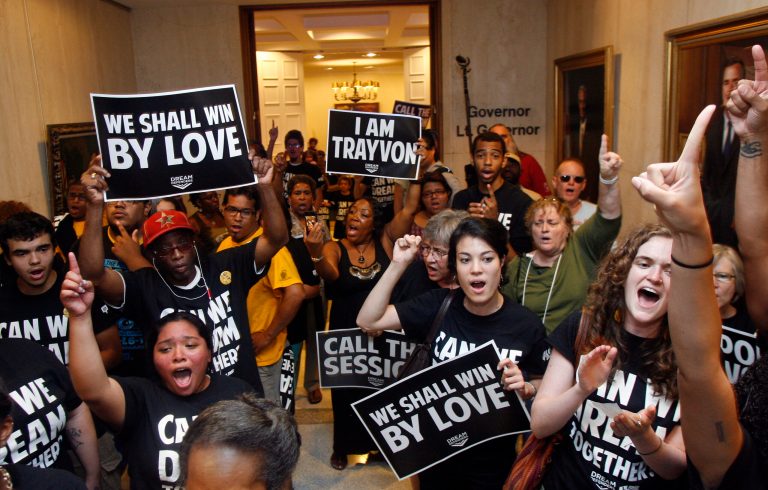 Dream Defenders and their supporters protest outside Florida Gov. Rick Scott's office in the Capitol in Tallahassee, Fla., last week. (AP/Phil Sears)
