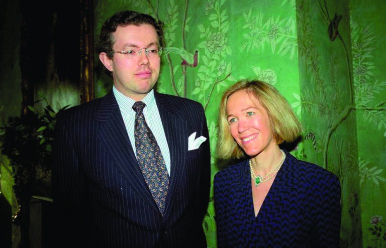 This photo of Nov. 26, 1996 shows Eva Rausing, right, and her husband Hans Kristian Rausing at Winfield House, London, the residence of the US ambassador to the UK attending the Glamour America Fashion Show and lunch. One of Britain's richest women, American-born Eva Rausing, was found dead in her west London home and a man was arrested in connection with the case, British police say, adding that an autopsy had failed to uncover a formal cause of death. Rausing, 48, was the wife of Hans Kristian Rausing, heir to the TetraPak fortune his father built by creating a successful manufacturer of laminated cardboard drink containers. (AP Photo/Alan Davidson/The Picture Library Ltd)