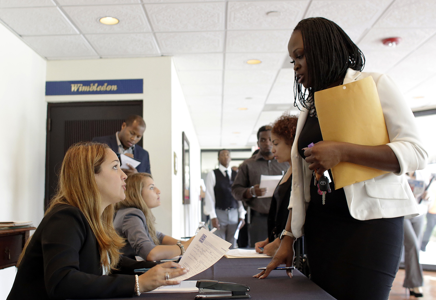 Jobless claims edge up to 266,000