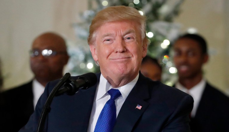 President Trump praised companies and corporations that revealed they would grant additional investments to their employees because of the GOP tax reform legislation. (AP Photo/Alex Brandon)