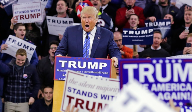 Donald Trump addressed a gathering during a campaign stop at the Tsongas Center in Lowell, Mass., Monday. (AP Photo/Charles Krupa)