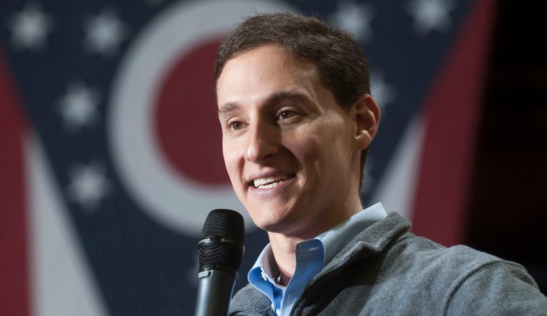 FILE-In this Saturday, Oct. 27, 2012 file photo shows Josh Mandel speaking before a rally for Republican vice presidential candidate Rep. Paul Ryan, R-Wis., at the Gradall Industries plant in New Philadelphia, Ohio. Records show Ohio treasurer Mandel's failed Senate campaign sold a vehicle totaled in a March wreck shortly after questions arose over the continued use of the vehicle, averting an insurance review that might have clarified it was properly used and insured. (AP Photo/Phil Long, File)