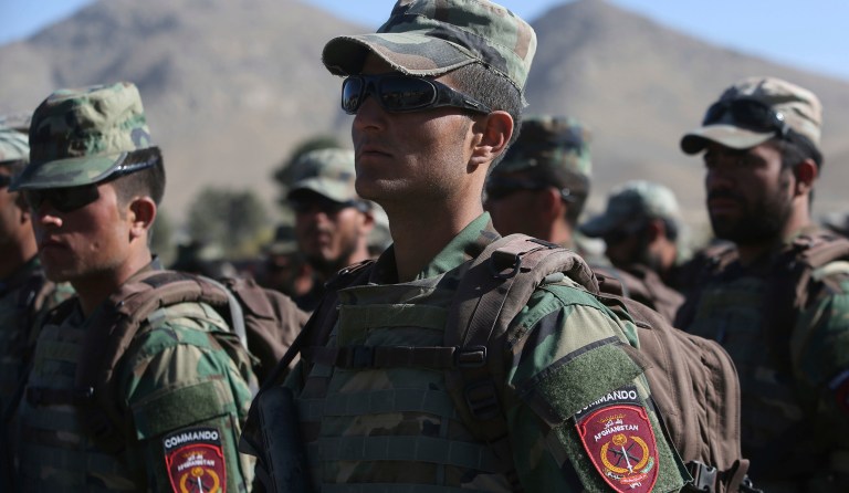 The rescued Afghans were taken to a secure location where they were screened before being released. (AP Photo/Rahmat Gul)
