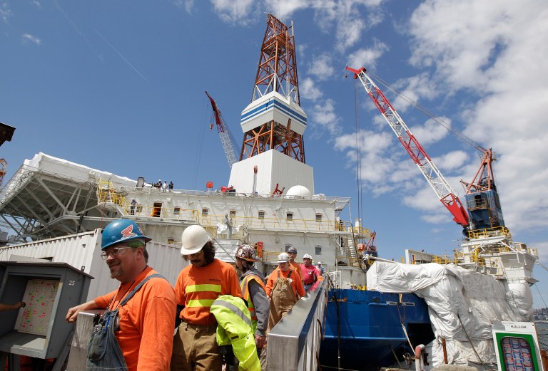 The rules require energy companies working in the Arctic to be able to predict, track, report and respond to changing ice conditions and other adverse weather events, which are common in the Arctic. (AP Photo/Ted S. Warren)
