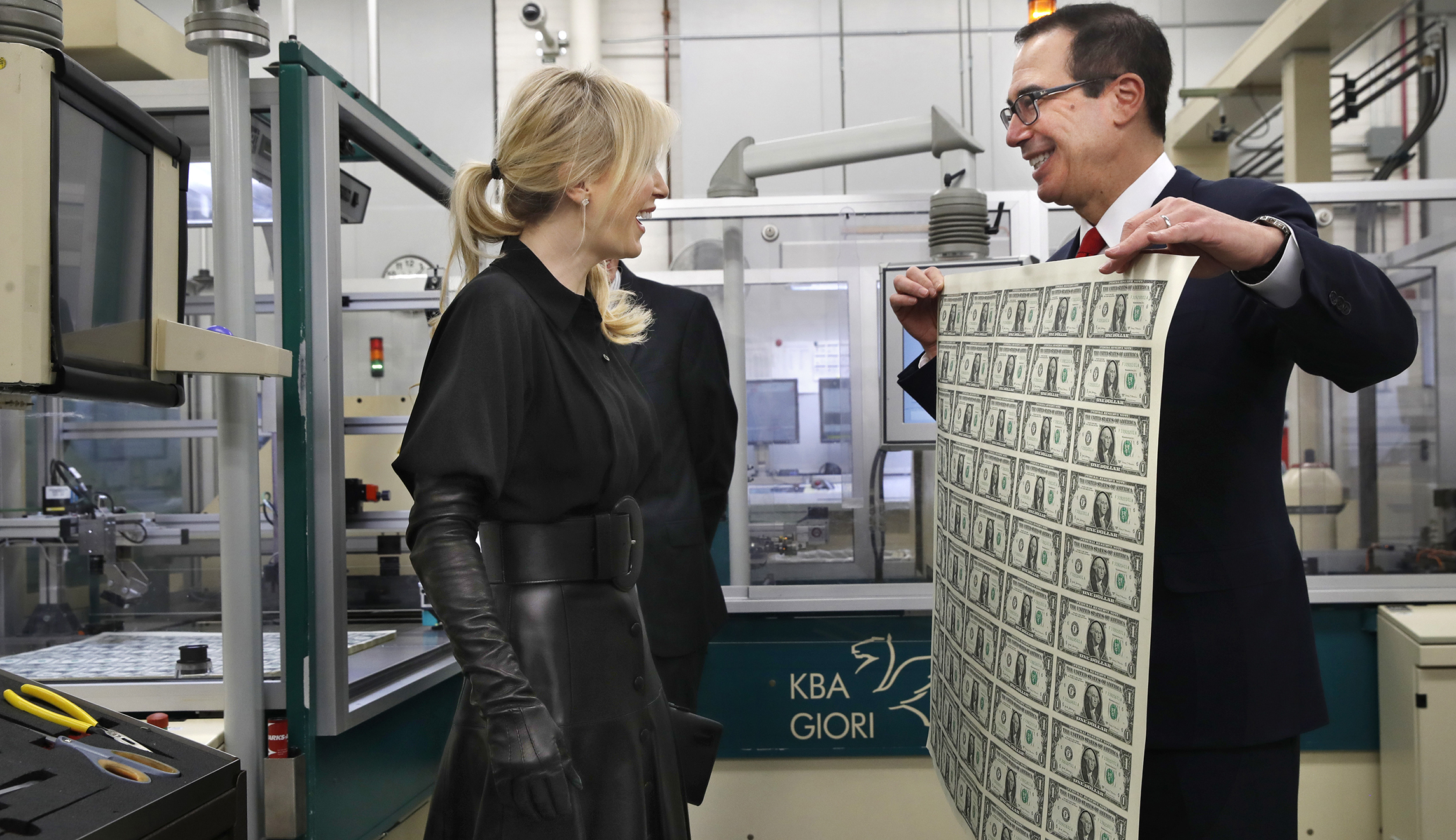 Twitter mocks Steven Mnuchin and his wife for posing with sheets of money
