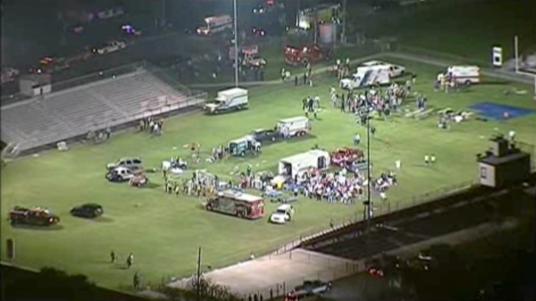 This video image provided by WFAA-TV shows injured people being treated on the flood-lit the high school football field turned into a staging area after the blast in West Texas Wednesday April 17, 2013. (AP Photo/WFAA-TV)