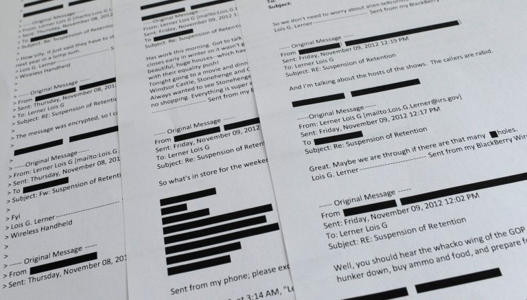 Lois Lerner emails obtained from the House Ways and Means Committee are displayed in Washington. (AP Photo/Susan Walsh)