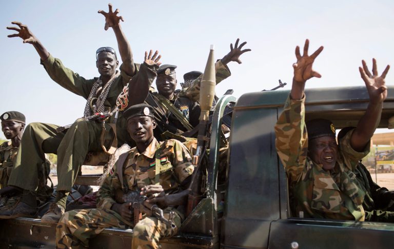 FILE - In this Sunday, Jan 12, 2014 file photo, South Sudanese government forces from the 