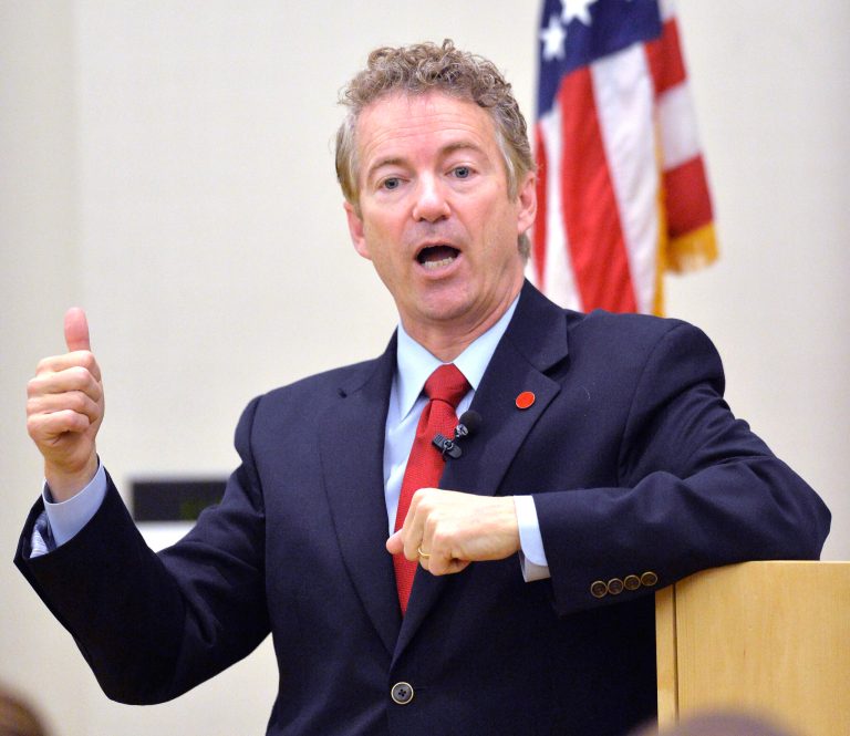 Kentucky Sen. Rand Paul speaks to the Chase Federalist Society at Northern Kentucky University, Friday, Nov. 21, 2014, in Highland Heights, Ky. (AP Photo/Timothy D. Easley)