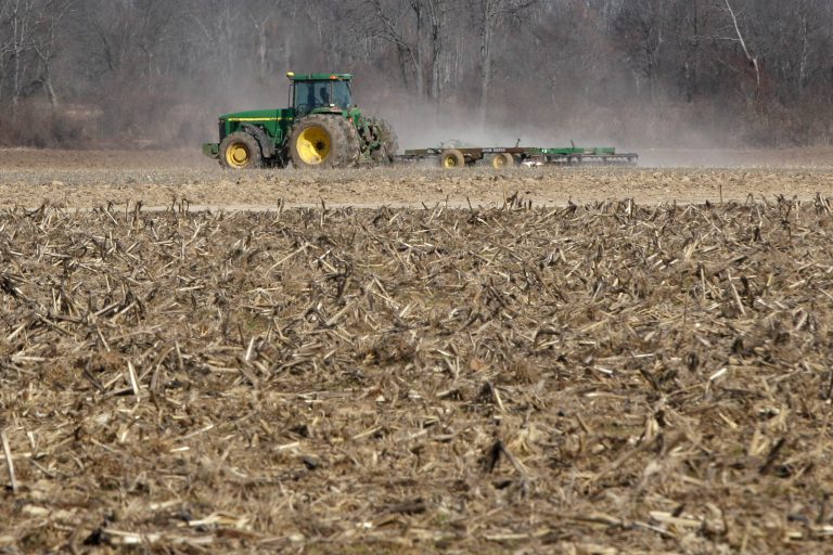 A farmer takes advantage of dry weather to till a field in preparation for spring planting near England, Ark.  (AP Photo/Danny Johnston, File)
