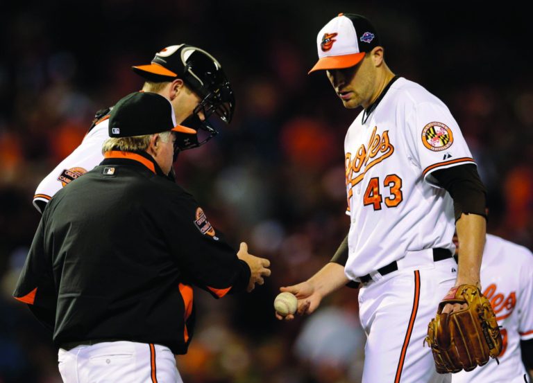 Patrick Semansky/AP
Jim Johnson allowed five runs on five hits and got only one out in the ninth inning of the Orioles' Game 1 loss to the Yankees on Sunday.
