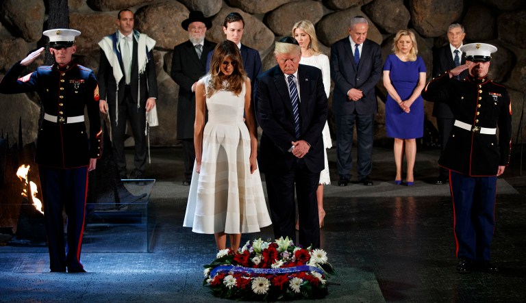 President Trump and first lady Melania Trump lay a wreath at Yad Vashem to honor the victims of the Holocaust, in Jerusalem, Tuesday. (AP Photo/Evan Vucci)